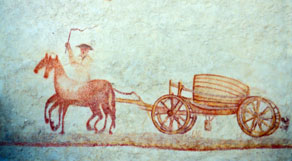 Ob mostovih in križiščih glavnih poti so stale mitninske postaje, kjer so morali trgovci, ki so potovali po obsoški cesti, plačati obvezne mitnine. Tu se je plačeval tudi davek na trgovsko blago. Pri prevozih vina z Goriškega na Koroško so sodelovali tudi furmani iz krajev ob Soči; motiv furmana pri  prevozu vina je s freske na domačiji v Dolenji Trebuši. (Arhiv ZVKD Nova Gorica, foto M. Kunst)