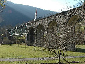 The Grahovo Viaduct today, with the parish church in Grahovo in the background. The Grahovo Viaduct today, with the parish church in Grahovo in the background.