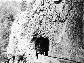 Right above the railroad tunnel there is a road tunnel cut into solid rock. Right above the railroad tunnel there is a road tunnel cut into solid rock.