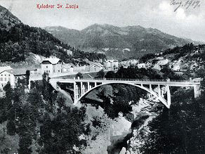 The Sveta Lucija - Tolmin (now Most na Soci) railway station from the right bank of the Idrijca River. The Sveta Lucija - Tolmin (now Most na Soci) railway station from the right bank of the Idrijca River.