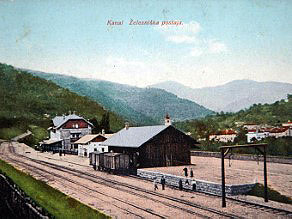 The platform of the Kanal railway station lies high above the deep, narrow channel of the Soca River. The platform of the Kanal railway station lies high above the deep, narrow channel of the Soca River.